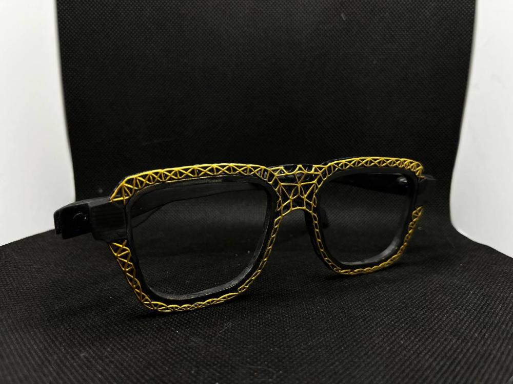 An ultralight anatomical eyeglass frame was created at NSTU-NETI